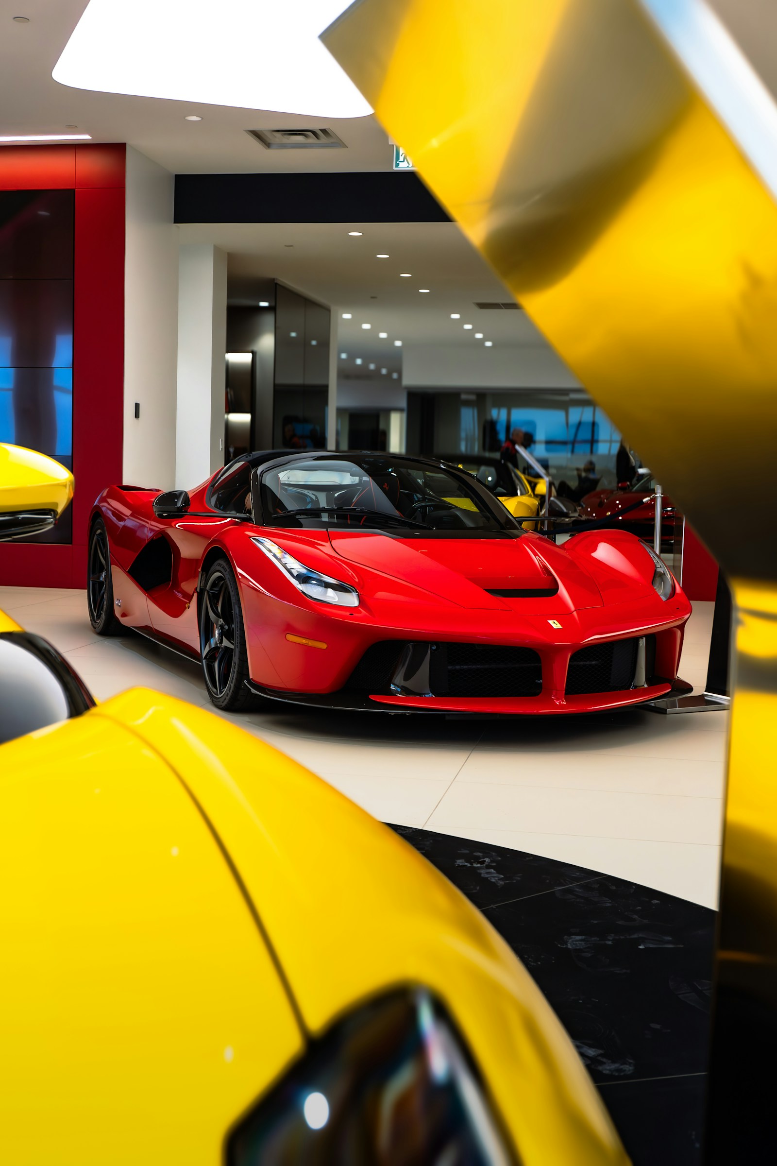 Red Ferrari sports car — premium pre-owned selection at Drip Motors